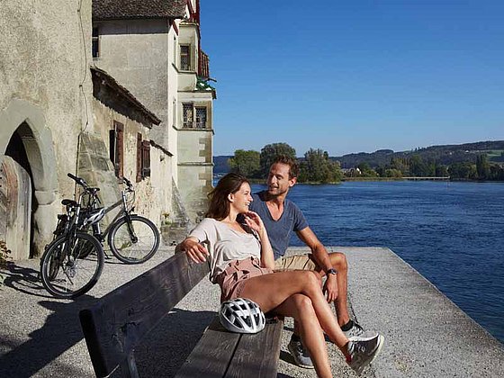 a couple is admiring the view of Lake Constance at Stein am Rhein