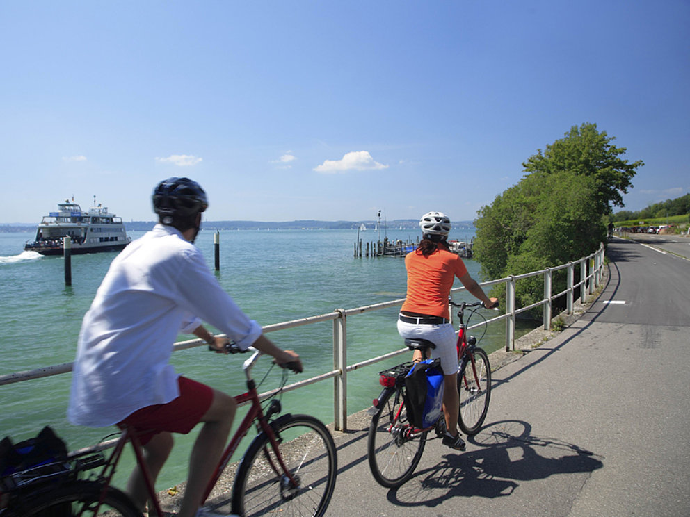 cyclists on the Lake Constance cycle path nearby the lakeside