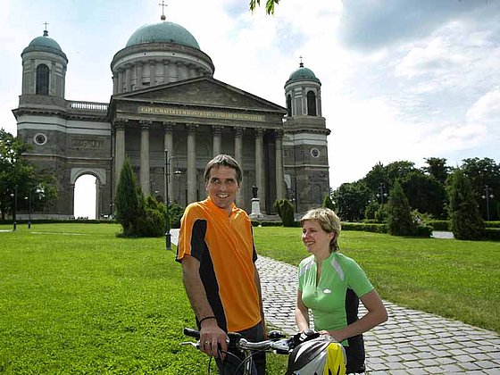 a couple is going to visit the basilica of Esztergom