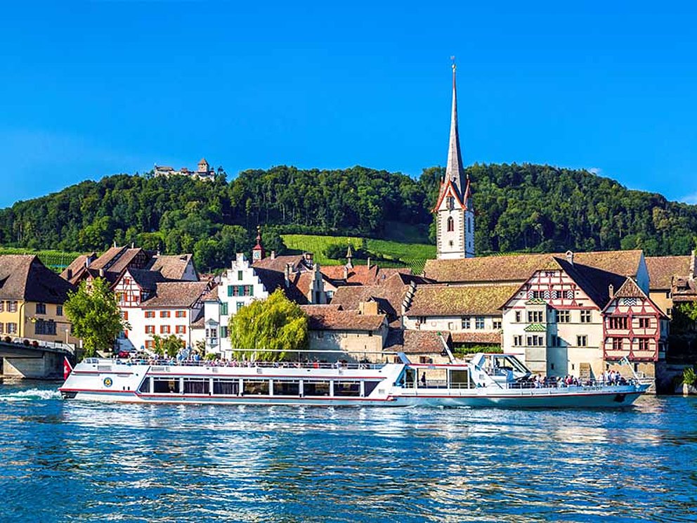 the historic town of Stein am Rhein, in the front lake Constance and an excursion boat
