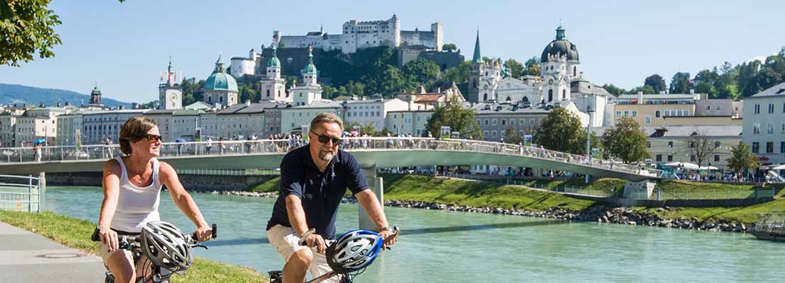 Radfahren in Salzburg mit Festung Hohensalzburg